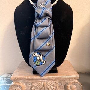 Blue and Gray Striped Tie with Necklace.